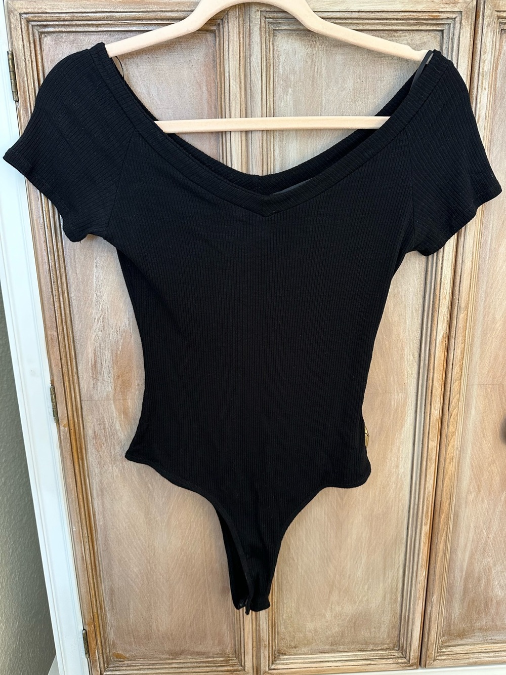 Lulu's Black Ribbed V-Neck Bodysuit